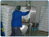 Bag splitter at the raw materials department